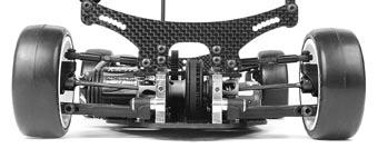 A lower roll center will generally produce more grip due to the chassis rolling, and the outer wheel digging in more.
