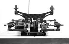 Downstops 2. Lift and drop the suspension arms so that they settle in their lowest positions. 3.