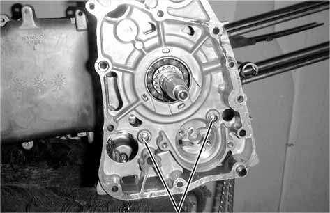 Place the right crankcase over the crankshaft and  Gasket Dowel