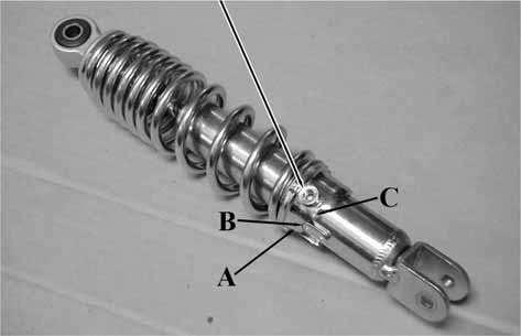 13. REAR WHEEL/REAR BRAKE/ REAR SUSPENSION Remove the rear shock absorber upper and lower mount bolts.