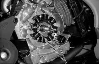 C. generator stator and pulser coil onto the right crankcase. Tighten the stator and pulser coil bolts. Torques: Pulser Coil : 0.5kg-m Stator : 0.