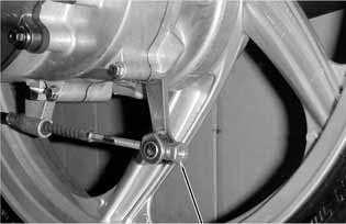 Free Play: 1020mm REAR BRAKE Measure the rear brake lever free play.