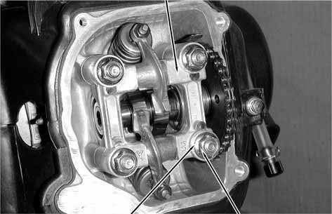 7. CYLINDER HEAD/VALVES CAMSHAFT INSTALLATION Turn the flywheel so that the T mark on the flywheel aligns with the index mark on the crankcase.