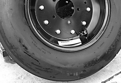 SHIELDING REPAIR Never remove split rim assembly hardware (A) with the tire inflated. DANGER Full chain shielding must be installed at all times. Thrown objects could injure people or damage property.