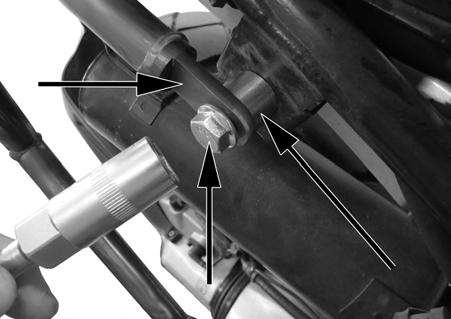 INSTALLATION INSTRUCTIONS (continued): STEP 3: Insert the supplied 8 x 20mm flange bolt through the top, left pannier mount tab 2 and into the threaded hole in the sub-frame.