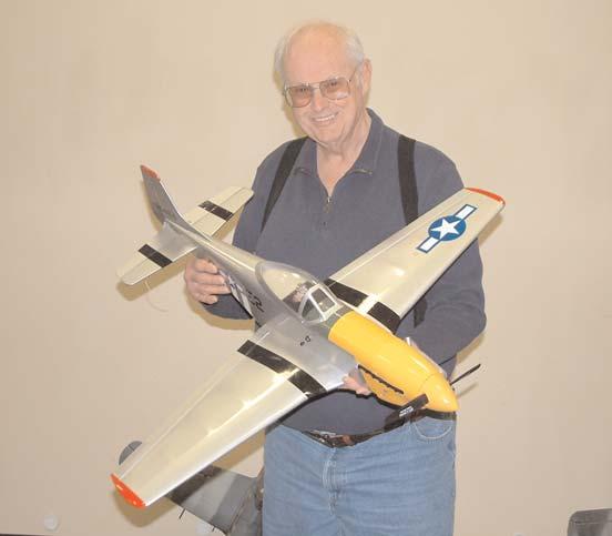 Meeting Activity: Four members brought five aircraft for showing and discussion. See the photos for details. Meeting was adjourned at 8:28 P.M. The Boherers discuss plans for an upcoming Douglas Skyraider.