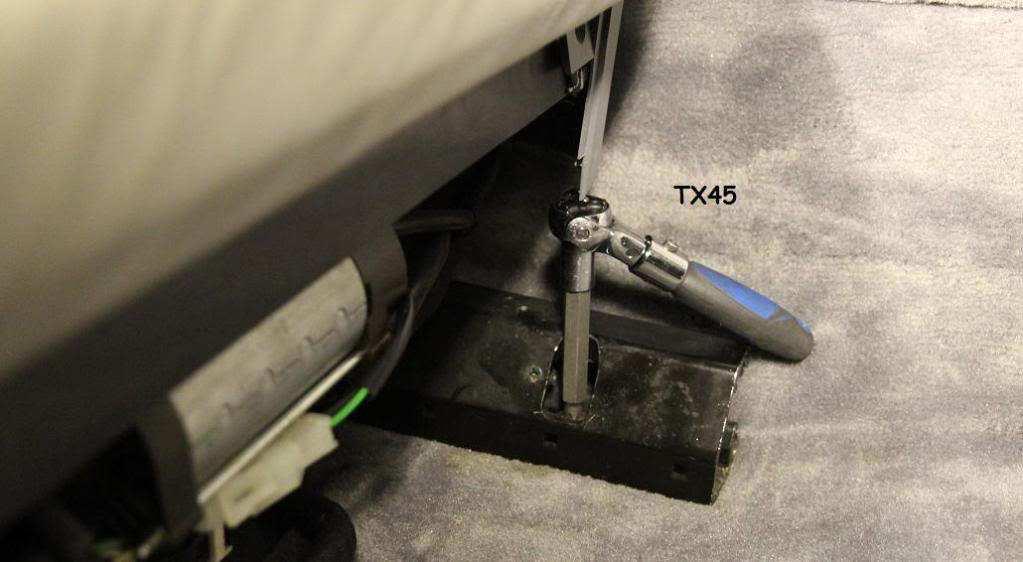 as it will go to expose the two front TX45 bolts holding the seat to the