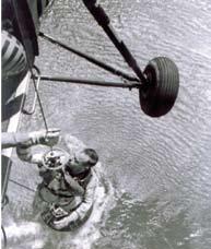 Shepherd is hoisted aboard the Marine HUS-1