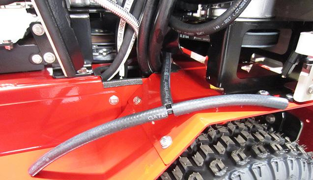 Install the center brine nozzle mount onto the main frame in front of the operator platform using ) / x bolts, washers, and