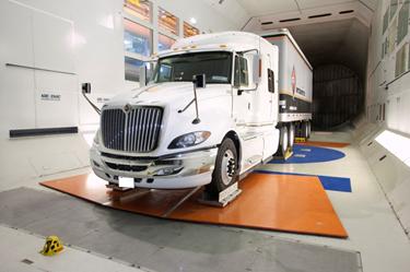 conducting emissions testing of heavy-duty vehicles at their test facilities to gather data on a range of