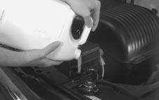 3. Fill the radiator with the proper DEX-COOL coolant mixture, up to the base of the