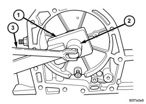 48. Use Wrench 6497 (1) and Socket Wrench 6498A (2) to remove the output