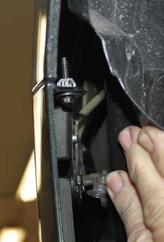 Using a 7MM socket, remove the ten (10) screws from the