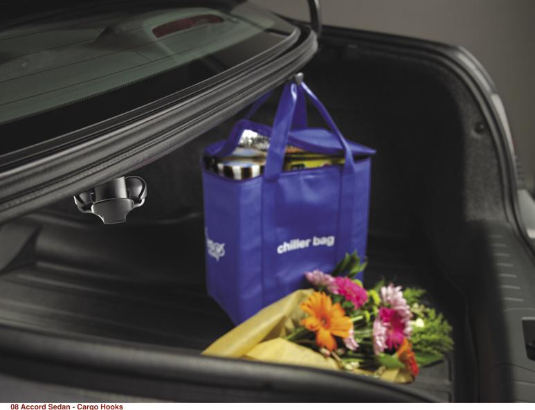 The Cargo Net helps keep your grocery bags upright and holds most loose items securely in place.