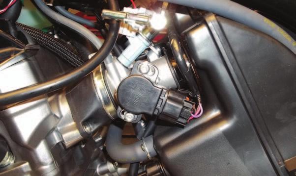 FIG.G 12 Locate and unplug the stock connectors from both Fuel Injectors at the top of the