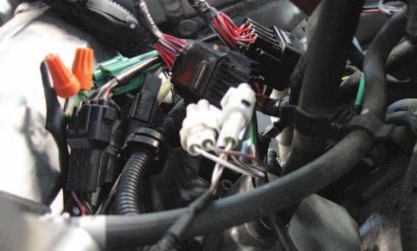 13 Plug the Ignition Module wiring harness in-line of each coil stick and stock connector (Fig. F). The Ignition Module leads with ORANGE colored wires go in-line of coil stick #1 (left most).