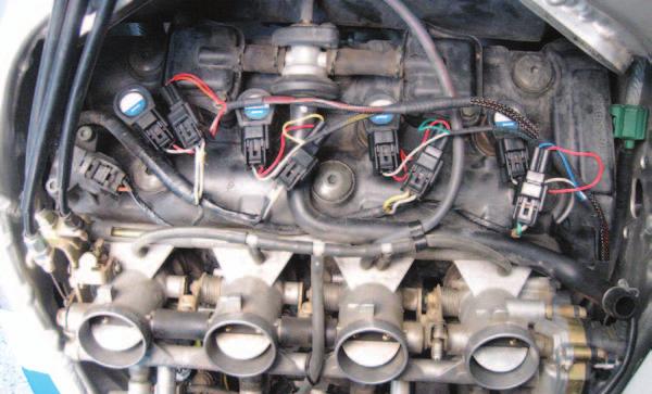F The Ignition Module leads with BLUE colored wires go in-line of coil stick #4 (right most). 14 Reinstall the airbox. Make sure all hoses and electrical connectors are reattached to the airbox.