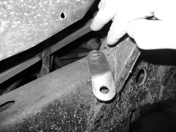 Save leaf spring hardware. 11. Install the new leaf spring to the frame and shackle mounts using the factory hardware. Leave hardware loose. 12.