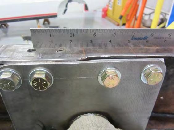 Measure from the center of the rivet hole from the factory Crossmember