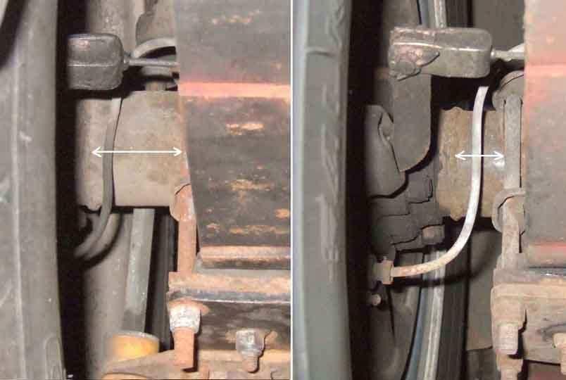 Page 3 of 16 Handbrake Cable, 1977-on Rear Axle Showing the rubber flap attached to a flange on the axle casing, to which a bracket on the handbrake cable is attached.