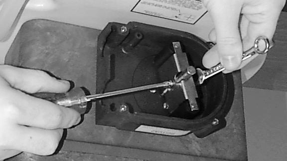 cutter Wire crimper /4" nut driver. Using the # Phillips screwdriver, remove the ten screws that hold the control panel on the control box (Figure ).