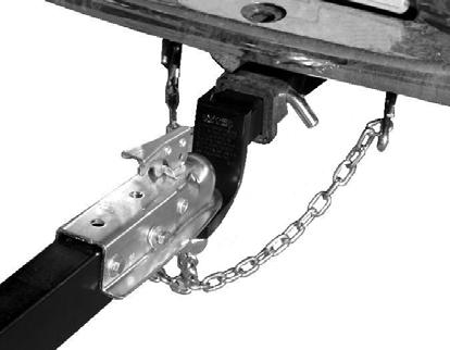 Pull the latch assembly on the Tow Hitch Assembly up and into the open position.
