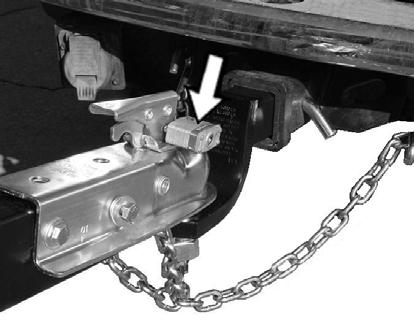 Hitch Coupler Adjustment Check 1. Place the proper size ball in the socket of the coupler and close the latch assembly (Figure 34). Verify that the locking trigger is properly engaged in its detent.