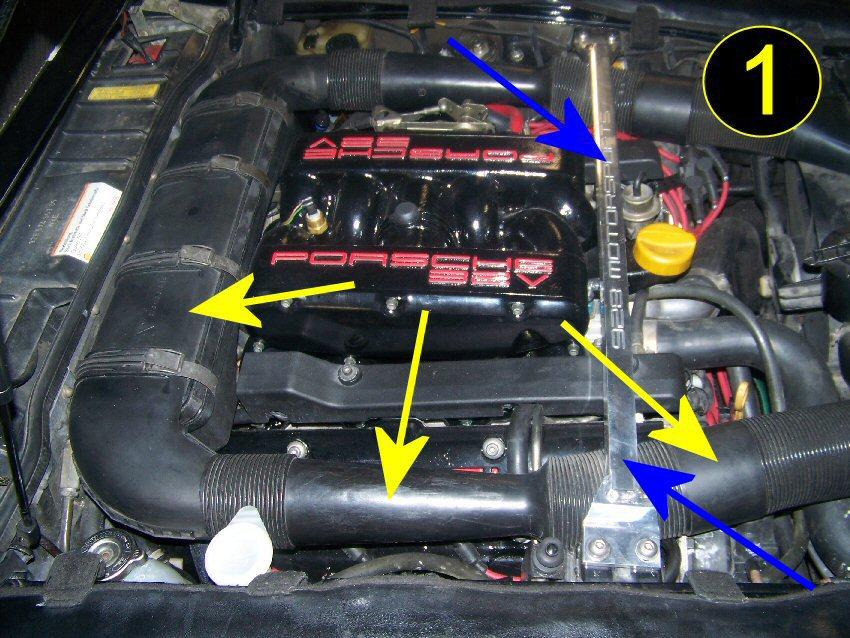 Start by removing the plastic cold air intake tubing and the top of the air filter housing as shown by the yellow arrows in Picture 1.