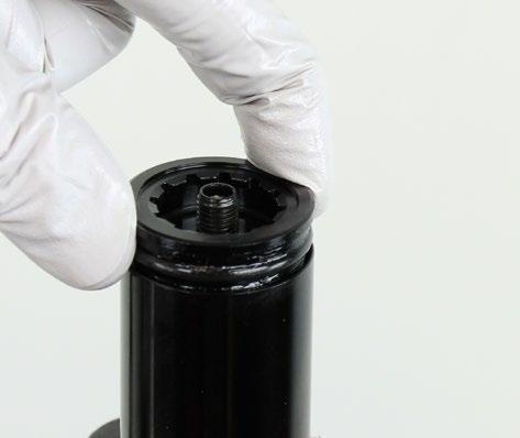 Install the air spring top cap into