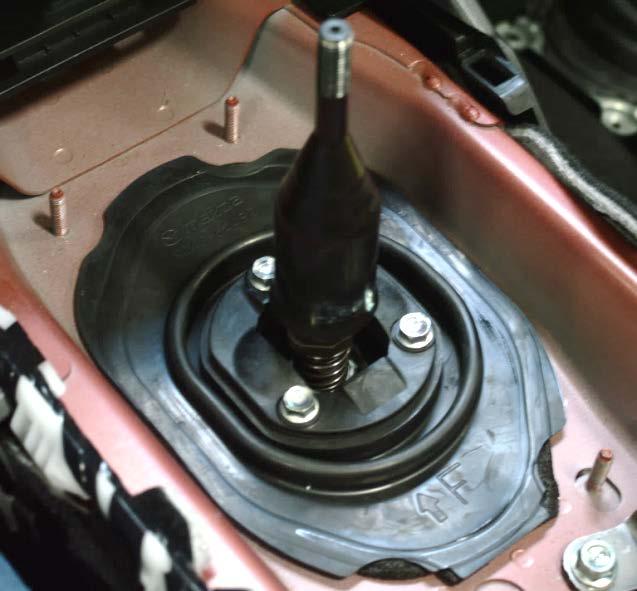 2. OEM Shifter Removal a) Remove the upper shift boot.