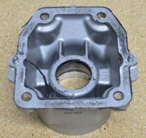 3. CorkSport Spacer Plate Installation a) Clean the gasket mating surfaces on the transmission and shifter base.