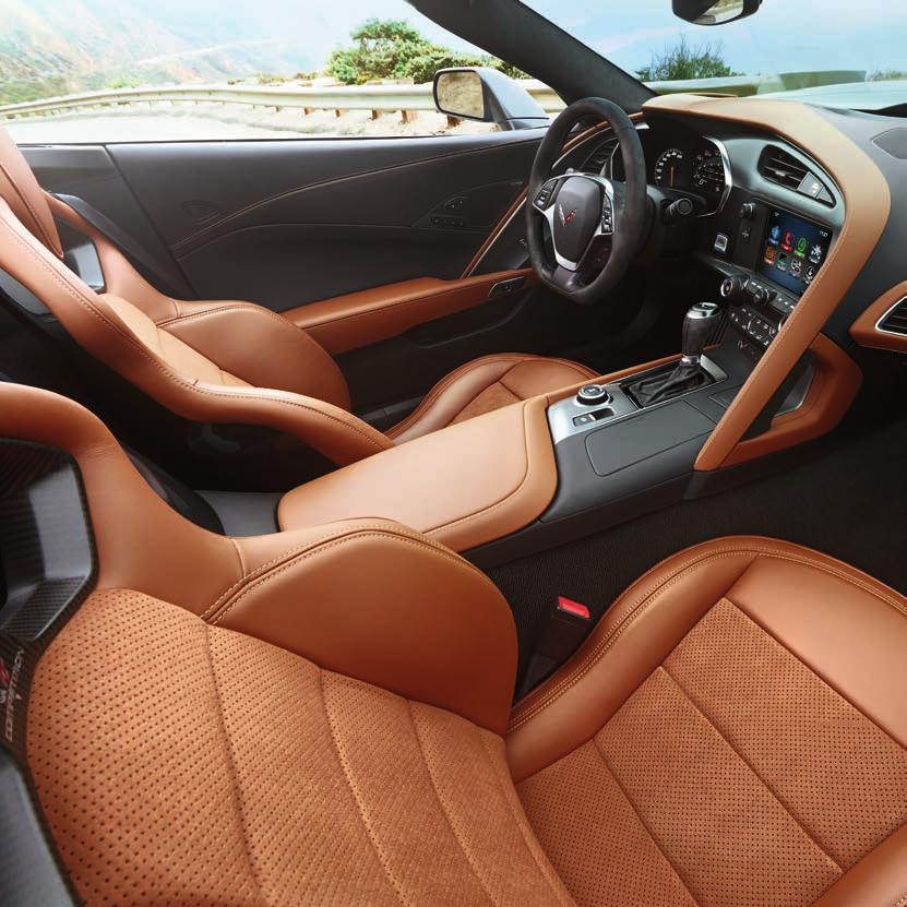 INTERIOR Corvette Stingray convertible 3LT. Shown in Kalahari with sueded microfiber-wrapped steering wheel and shifter, available Competition Sport seats, and other available features.