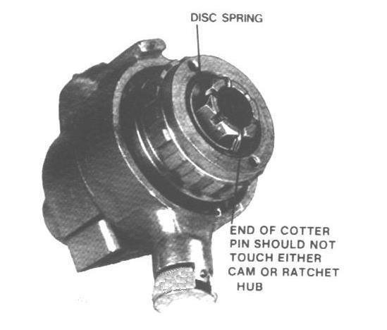 Then continue to tighten nut at least one but no more than two slots in order to align hole in shaft with slot in nut. Insert the cotter pin and bend the ends of same as shown in Fig. 5. Fig. 3 C.