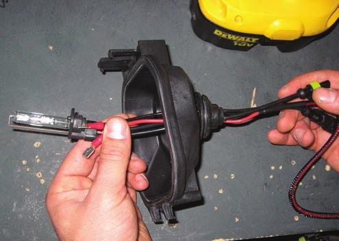 1 2 Using a drill with a Uni-bit (pictured) or a 7/8 wood spade