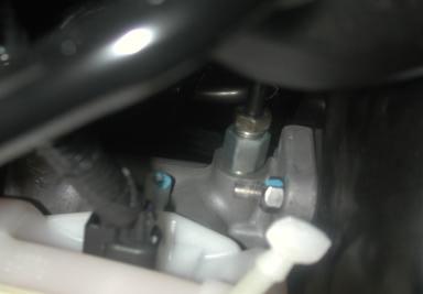 3. Next, remove the brake line that runs to the rear port of the master cylinder.