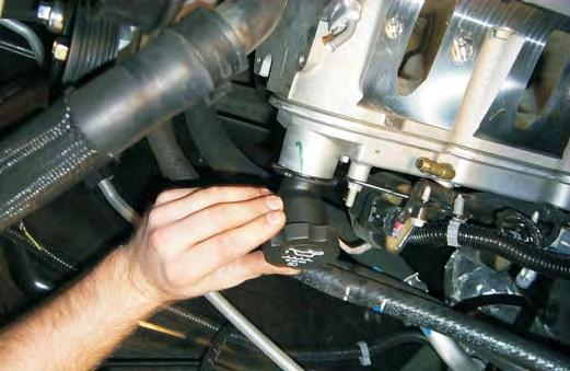 Install the short oil filler neck supplied by inserting it into the valve