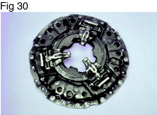 Clutch Cover/Intermediate Clutch Cover Plate / Intermediate Plate Failure - Oil Soaked Cover A leaking transmission or a leaky rear main engine seal can coat the clutch cover with oil, as indicated