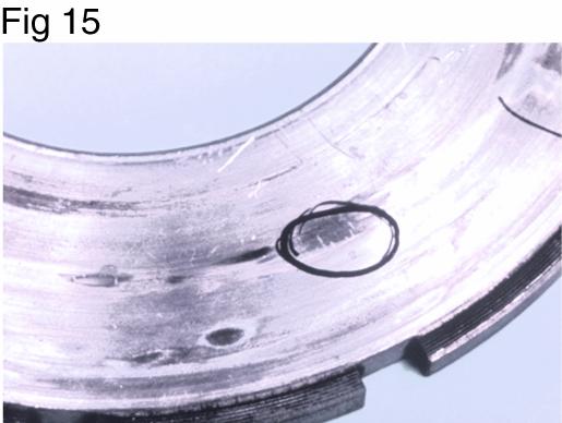 Clutch Cover/Intermediate Plate In Figure 15, an area of the intermediate plate has been circled to reveal the damage of heat checks.