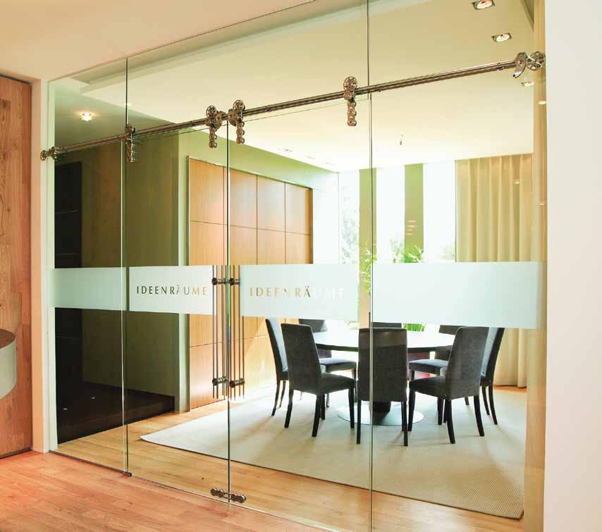 VISIBLE BARN DOOR SYSTEMS Decorative sliding wall-mounted systems