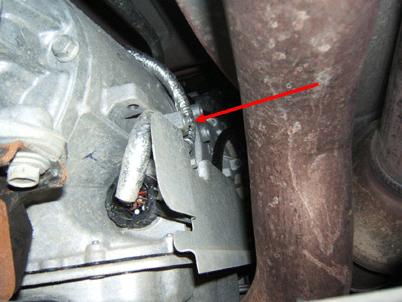3. Locate the 16-way electrical connector on the right side of the automatic transmission as shown. 4.