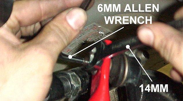 7) Use a 12mm socket or wrench and the stock hardware to