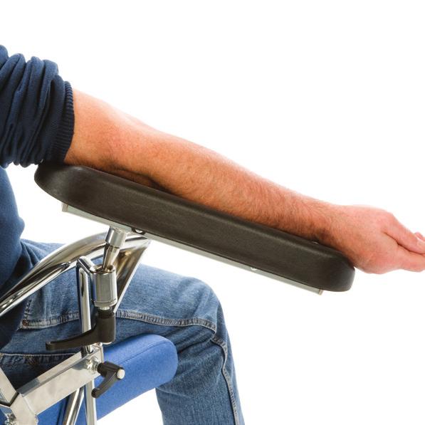 Integral arm supports on each side assist the patient in mounting and dismounting the chair.