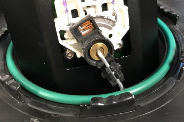 prevent fuel level float arm interference.