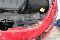 Do this on both sides of vehicle. Remove the top cover and set aside. 2.