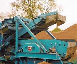 Belt type: Transfers material from top deck of screen to re-circulating conveyor.