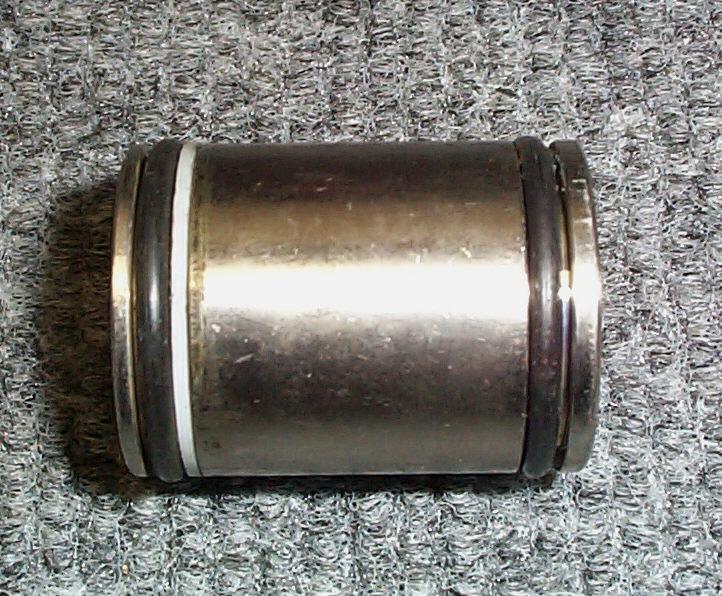 Lubricate the Piston Cups and the inside surface of the Cylinders with Super Lube or Silicone lubricating gel. Also lubricate the O-rings on the outside of the Cylinder.