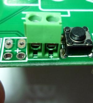 Pass the wires through the strain-relief holes and then back down into the actual holes, and solder them in place.
