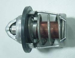 Remove the cover attaching bolts and separate the thermostat housing. Remove the O-ring from the thermostat housing.