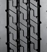 Robust four rib tread design for increased durability in high scrub applications. Zig-zag groove geometry engineered specifically for use in waste haul.