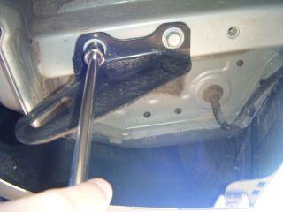 frame rail using the 7mm socket, 8" extension and ratchet. Return the bracket and fasteners to vehicle owner.